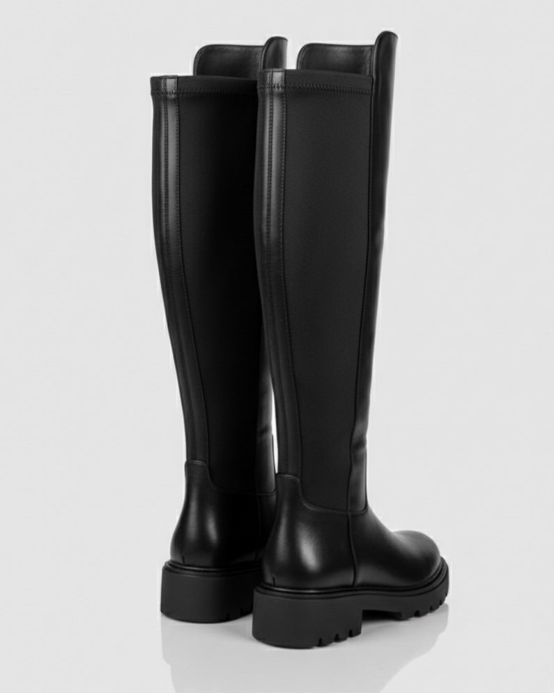 Stivali alti sopra il ginocchio in pelle nera con inserto elastico posteriore e suola chunky a carrarmato - retro tacco.