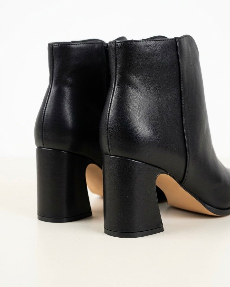 Stivaletti tronchetti da donna Kiss neri con punta affusolata, tacco medio comodo e zip interna - Buttò Calzature - retro.