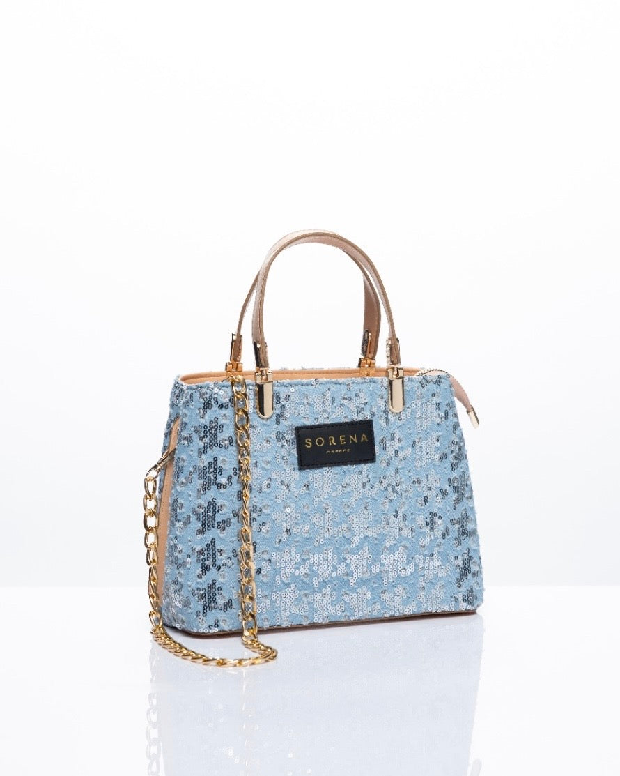 Borsa a mano e tracolla Sorena prodotta in Grecia ricoperta di paillettes azzurre e argento con manici nude, etichetta nera e catena dorata - Buttò Calzature.
