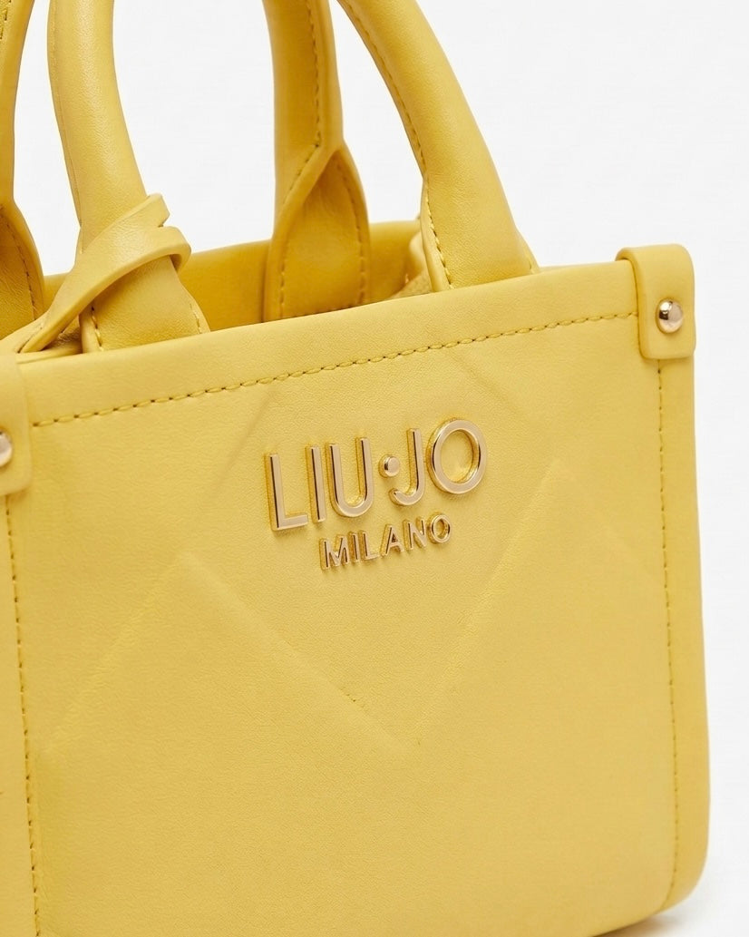 Mini borsa a mano e a tracolla Liu Jo gialla con doppi manici, chiusura a zip e logo dorato - Buttò Calzature - dettaglio.