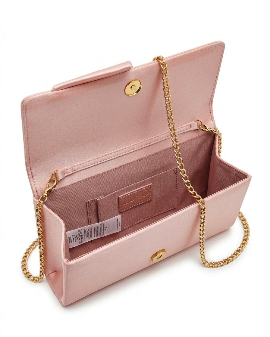 Pochette Liu Jo in satin rosa cipria con nodo centrale e logo in strass e catenina oro-interno.