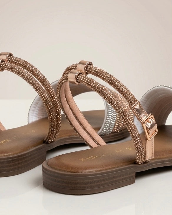 Sandali bassi con pianta cuoio e fascia a listini multipli sfumati in oro rosa, platino e argento con micro-strass luminosi e cinturino alla caviglia - Buttò Calzature - retro.