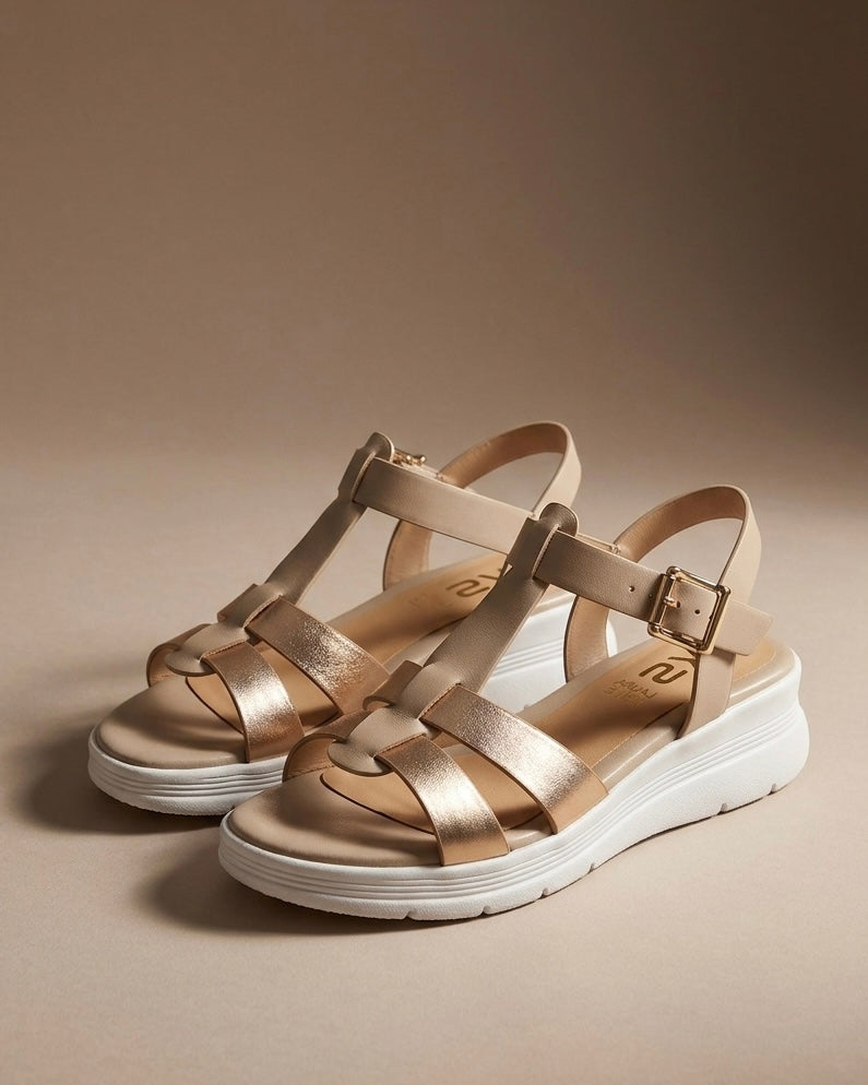 Sandali Keys donna beige con fasce in pelle metallizzata oro rosa, struttura a ragno e suola platform bianca - Buttò Calzature.