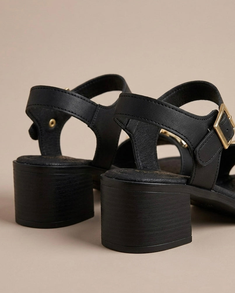 Sandali neri con tacco medio largo senza plateau, fascia singola sul davanti con morsetto dorato lavorato e cinturino alla caviglia - Buttò Calzature - retro.