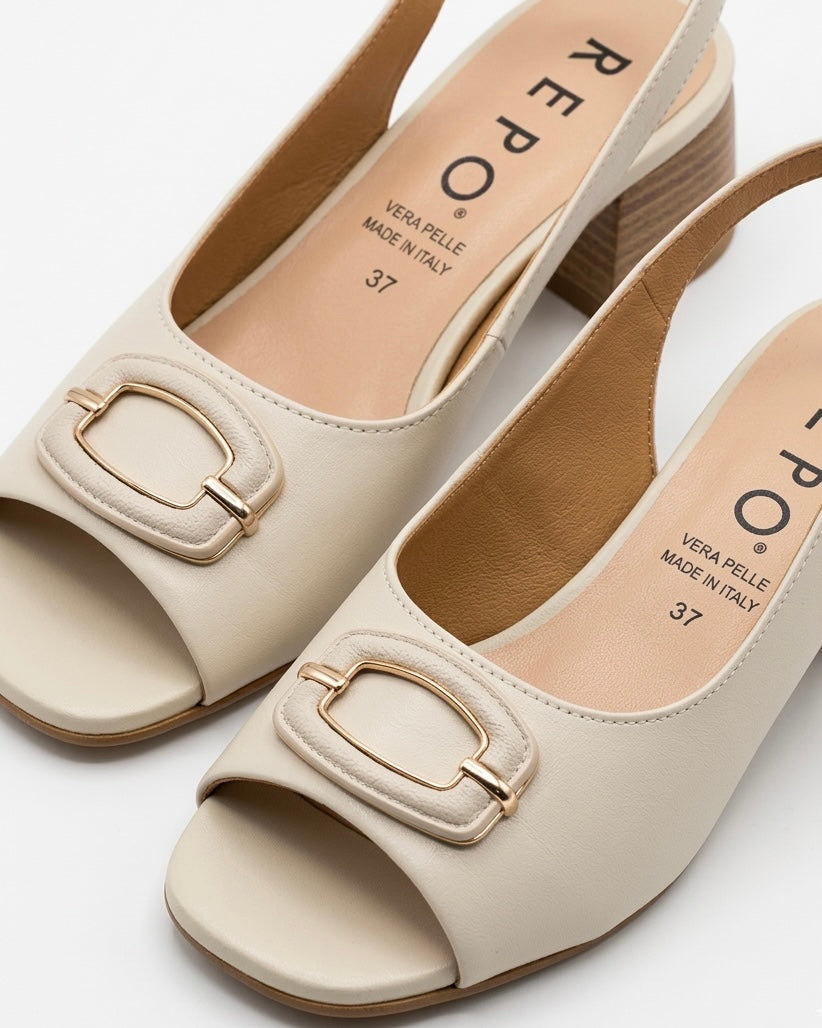 Sandali donna REPO slingback in pelle avorio con fibbia oro e tacco largo effetto legno, vista laterale qualità editoriale-dettaglio.