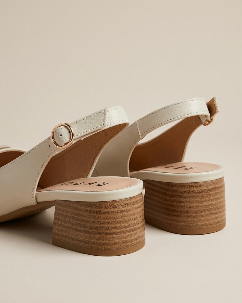 Sandali donna REPO slingback in pelle avorio con fibbia oro e tacco largo effetto legno, vista laterale qualità editoriale-retro tacco.